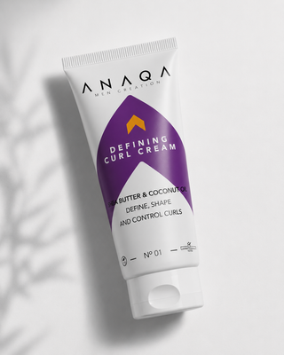 Tube of ANAQ Defining Curl Cream on a light background